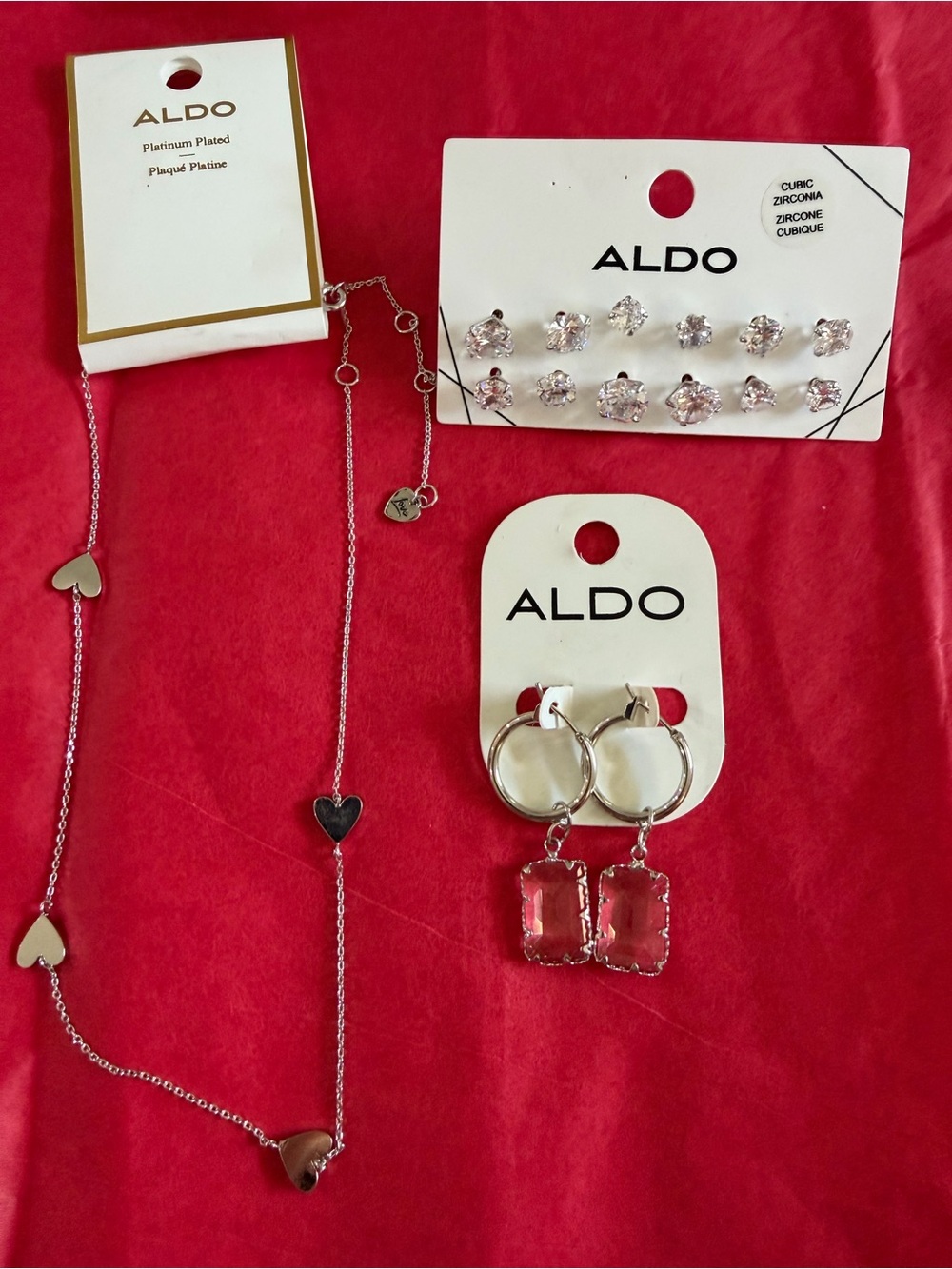 ALDO Silver Heart Necklace with Clear Stone Drop Hoop Earrings and Clear CZ Stud